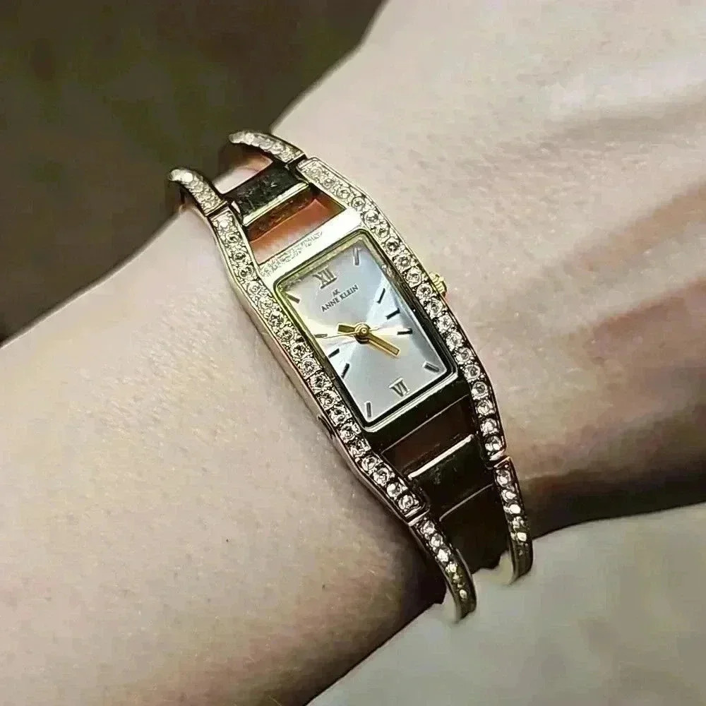 Anne Klein Gold Tone & White Gem Bracelet Watch with Expander Link & Silver Face